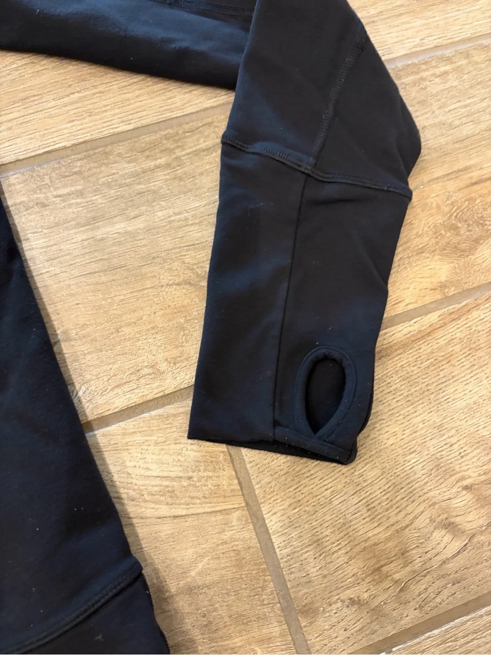 lululemon women’s black hooded Jacket size 4